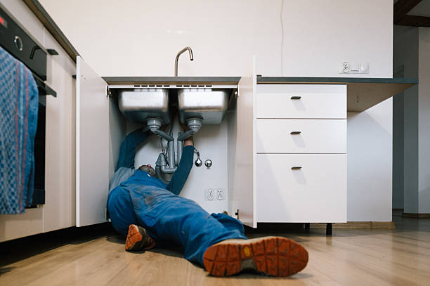 Professional Drain Cleaning technician working in Harper, KS
